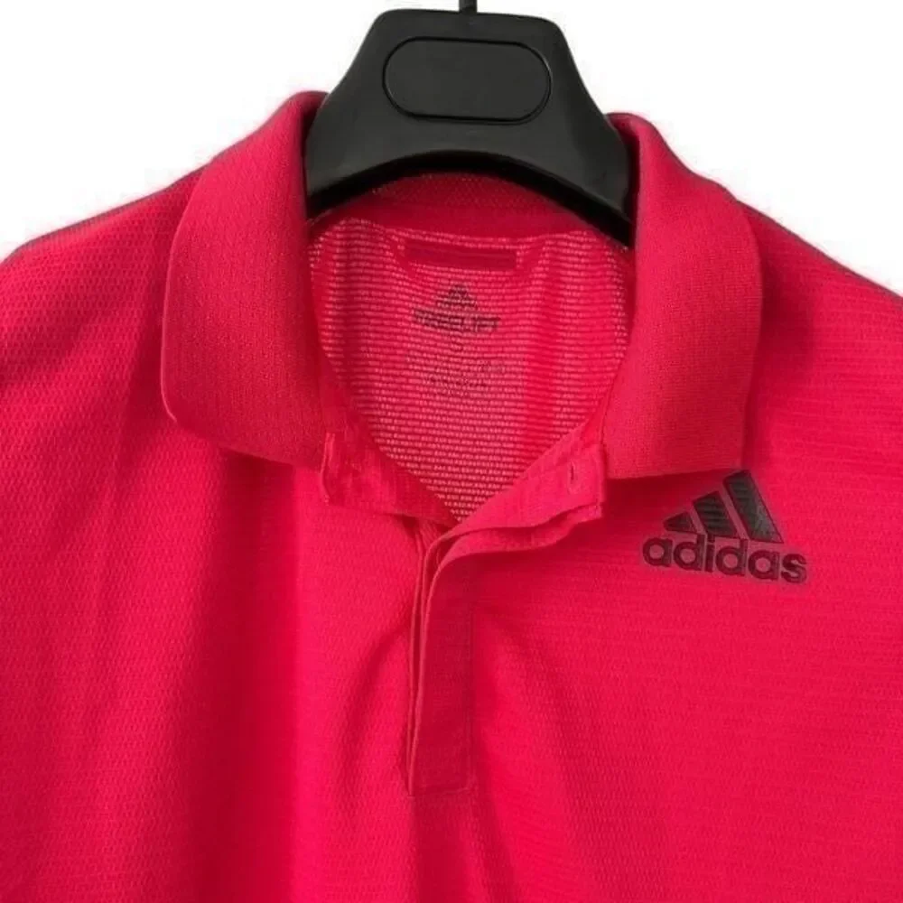 Adidas freelift polo color raspberry size S. A424
